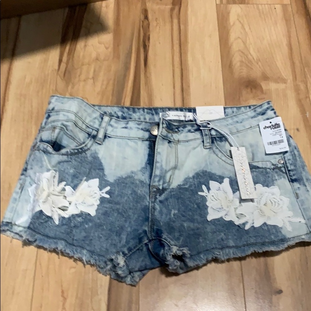 Juniors denim shorts with lace flowers